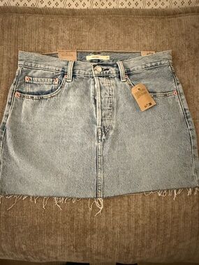 Light Wash Denim Mini Skirt with Raw Hem